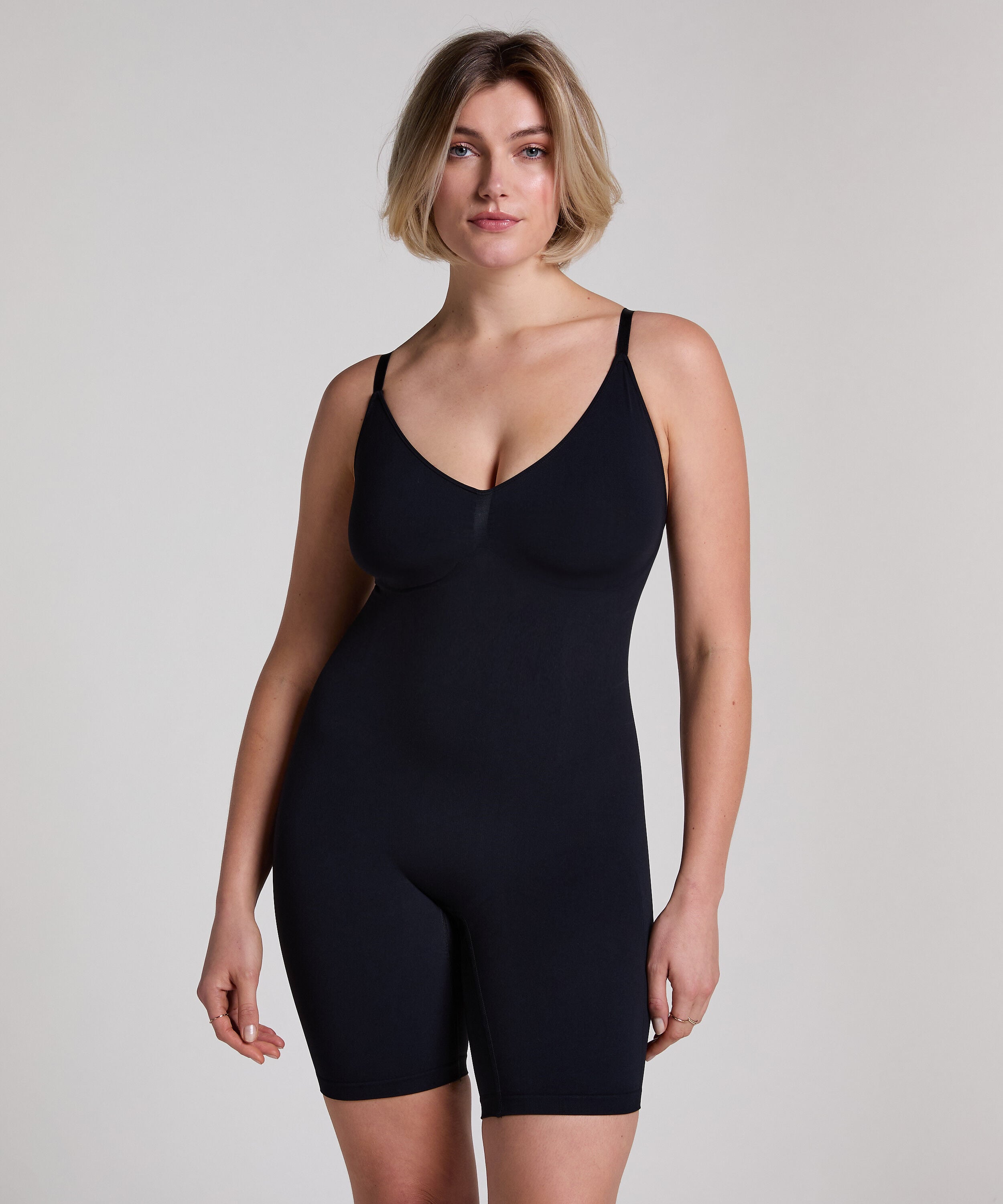 Sømløs forstærkende lårslanker